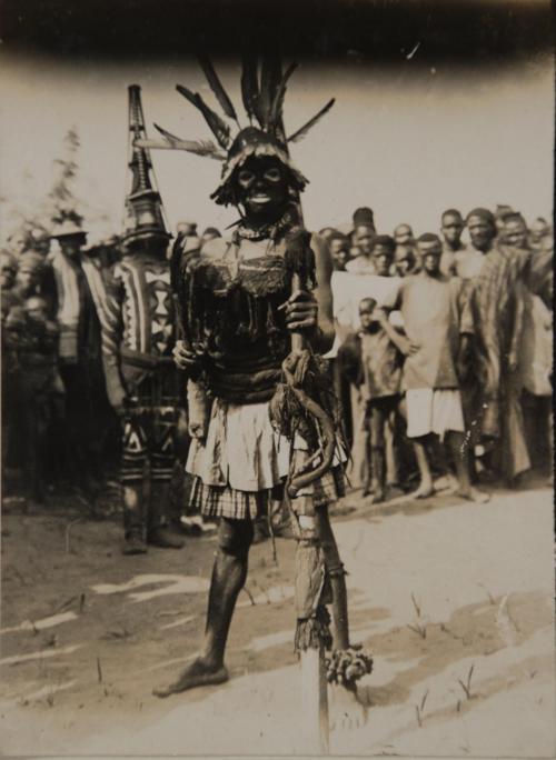 Igbo dibia at a masquerade dance, Nri-Awka Igbo